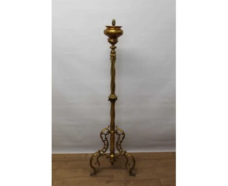 Decorative gilt brass standard lamp, classical style with acanthus mounts and central twist column on scrolling tripod base, 