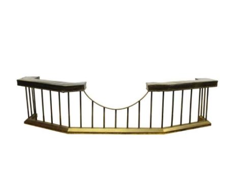 Brass and green leather club fender, of unusual canted form, leather seat raised on bars and shaped kerb, approximately 248cm