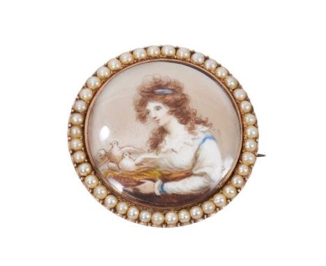 Georgian miniature portrait brooch with a circular painted miniature depicting a lady with two love birds, in gold and seed p