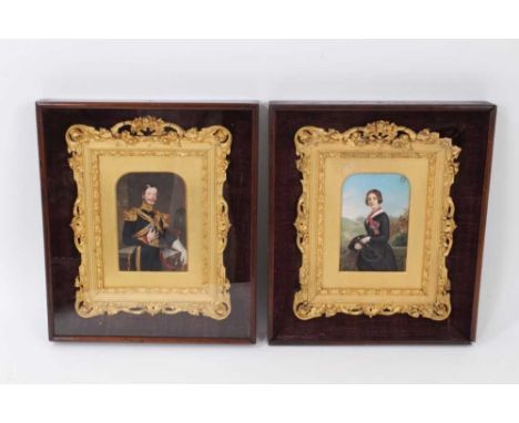Pair of fine quality overpainted portrait photographs of a military officer and his wife, each presented in arched gilt frame
