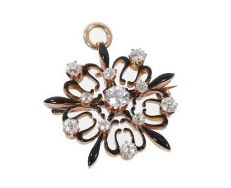 Victorian diamond and black enamel pendant/brooch in the form of a snowflake with old cut diamonds and black enamel decoratio