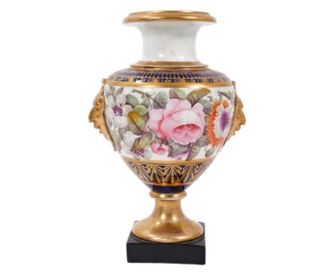 Regency Coalport pedestal urn, with satyr mask handles, finely painted in polychrome enamels with flowers, on a cobalt blue a