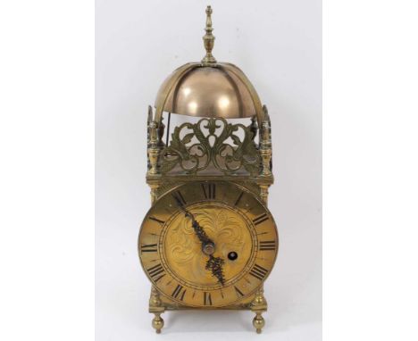 Antique brass lantern clock with fusee movement striking on bell in brass case with pierced crestings 40cm highCondition repo