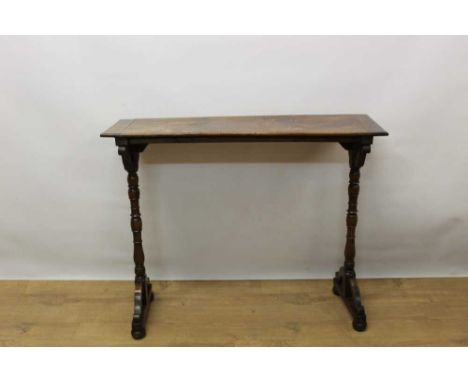 19th century fruitwood Continental prayer book table, with narrow cleated top raised on bobbin turned supports and sledge end