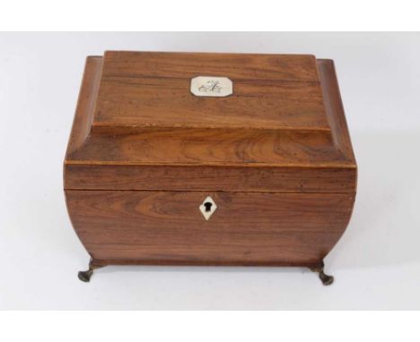 Regency fruitwood tea caddy of sarcofogus form with gilt metal mounts, twin compartments with covers 21.5cm wide