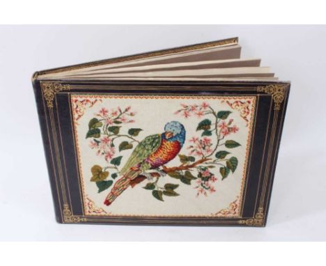 A 19th Century leather and tapestry mounted album housing a large number of botanical watercolours by various hands, approxim