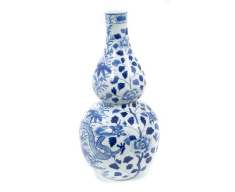 Chinese blue and white double gourd vase, early 20th century, painted with dragons and flowers, four-character Kangxi mark, 3