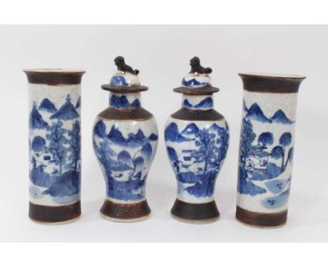 Two pairs of 19th century Chinese blue and white crackle glaze vases, painted with landscape scenes, 20cm and 22cm high (4)Co