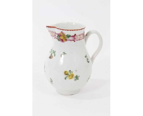 A Bristol milk jug, circa 1772, polychrome decorated with floral sprays and a patterned border, 9.25cm highCondition report: 