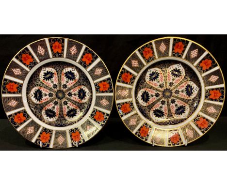 A Royal Crown Derby Imari palette 1128 pattern diner plate, 26.5cm, first quality; another, second quality (2) 