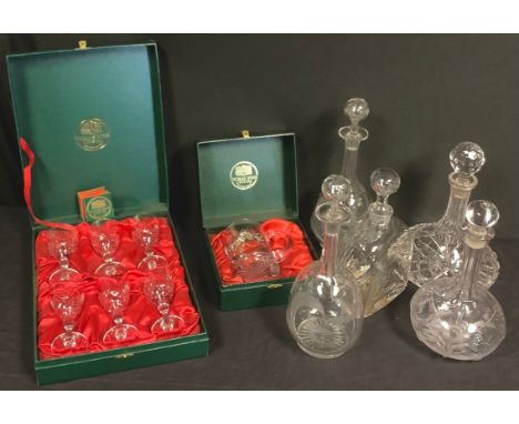 A cut glass ship's decanter, other decanters; a set of six Thomas Webb Crystal sherry glasses, boxed; a similar mug, boxed; q