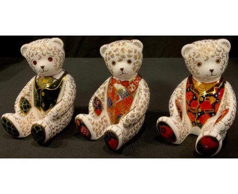 A Royal Crown Derby paperweight, Debonair Bear, Collector's Guild exclusive, gold stopper, boxed; two others, Red Tie Teddy B