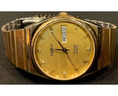 A gentleman's Tissot Seastar Automatic watch, baton indicators, centre seconds, day/date aperture, integral bracelet strap, b