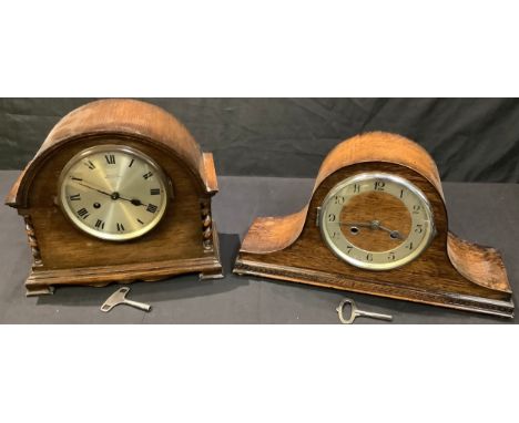 An oak mantel clock, chiming; another oak Napoleon hat mantel clock (2) 