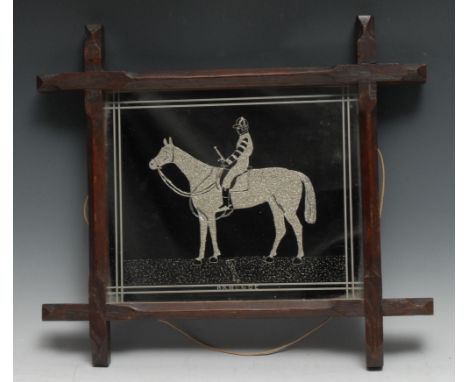 Folk Art - a late 19th century novelty equestrian looking-glass, the rectangular mirror plate engraved with a full-length por