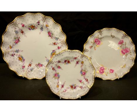 A Royal Crown Derby Royal Antoinette pattern shaped circular plate, a similar tea plate, seconds; a Royal Pinxton Roses patte