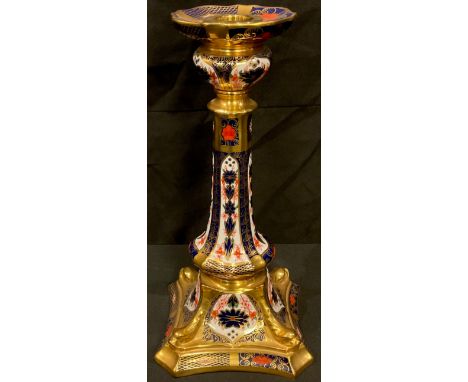 A Royal Crown Derby Imari palette 1128 pattern Castleton candlestick, dolphins to angles, 27cm, first quality 