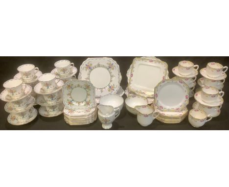 A Duchess China tea service for twelve comprising cake plates, side plates, cream jug, sugar bowl, cups and saucers; another,