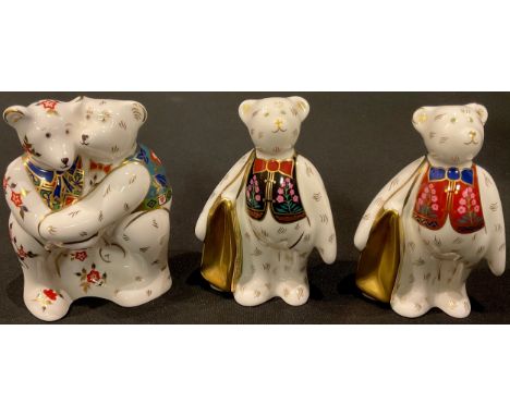 A Royal Crown Derby Teddy Bear model, Harrods Shopper Bear, Harrords' exclusive, certificate, boxed; two others, Bear Hug and