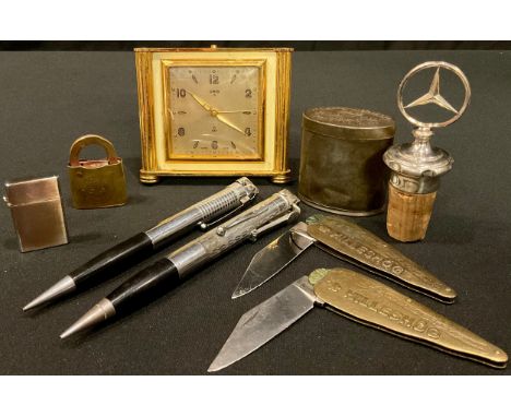 A Ronson novelty lighter pen; a Lura novelty lighter pen; a Hilleshog penknife; another similar; a Mercedes bottle top; an Or