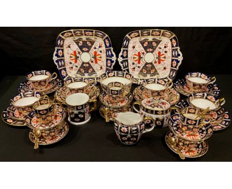 A Royal Crown Derby Imari palette 2451 pattern tea and coffee set, comprising six teacups, saucers and tea plates, six coffee