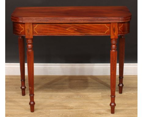 A mahogany D-shaped tea table, hinged top with channelled edge, brass strung frieze, reeded legs, arrow feet, 74cm high, 90.5