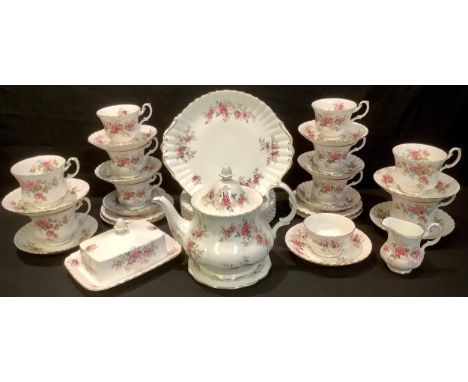 A Royal Albert Lavender Rose pattern tea set comprising, teapot, teapot stand, milk jug and sugar bowl, six cups , saucers an