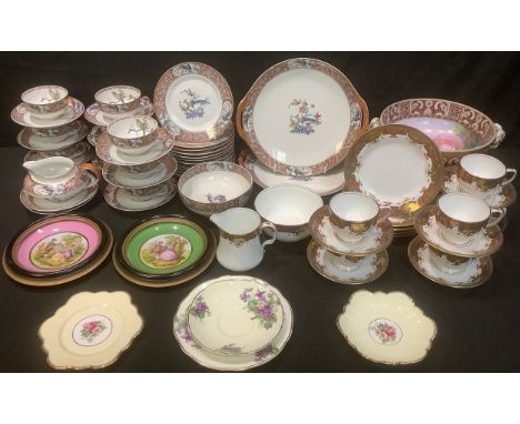 Ceramics - a Thomas Haviland Limoges part tea service comprising cake plates, side plates, cream jug, sugar bowl, cups and sa