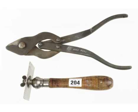 An adjustable scraper by STARRETT and a pair of folding wire cutters with broad arrow 1957 G++
