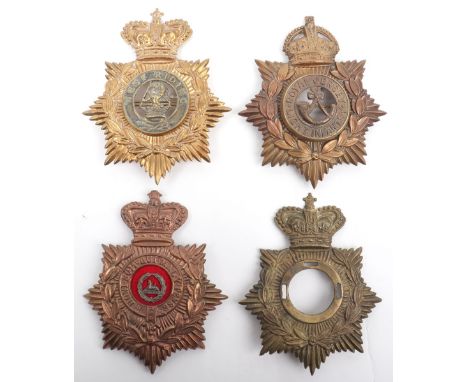 4x Other Ranks British Helmet Plates, consisting of post 1902 example with Royal Jersey Light Infantry centre; Re-strike Vict