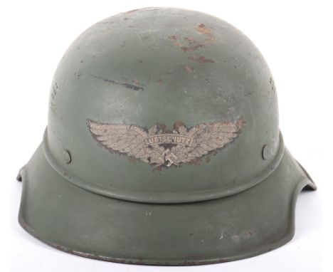 WW2 German Luftschutz Helmet: Over green painted helmet with decal to front, complete with liner and chin strap. 