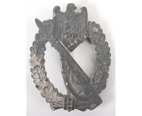WW2 German Army / Waffen-SS Infantry Assault Badge, silver grade example with remains of the silver wash finish to the obvers