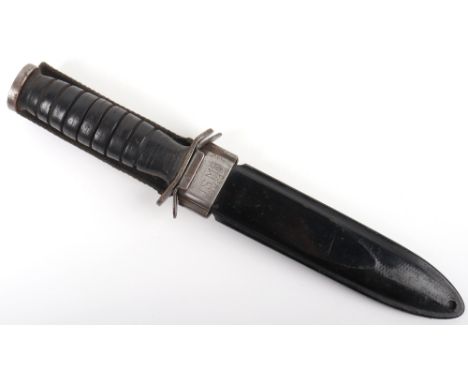 US M3 Fighting Knife: Knife is stamped U.S.M3-UTICA to blade and armour marked to top of hilt, in M8 scabbard