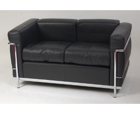 Le Courbusier & Charlotte Perriand for Cassina - an LC2 black leather and tubular chrome framed two-seater sofa, with stamped