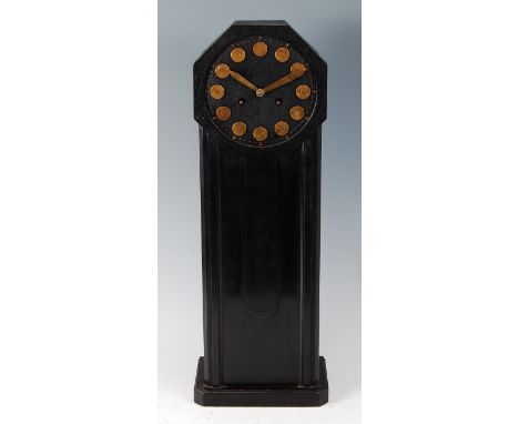 In the manner of Charles Rennie Mackintosh - a 1930s ebonised oak mantel clock, the dial with brass handles and numeral round