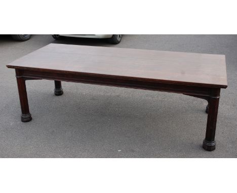 An Arts & Crafts oak refectory table, the plain top with thumb-moulded lower edge, having single end drawer, raised on octago