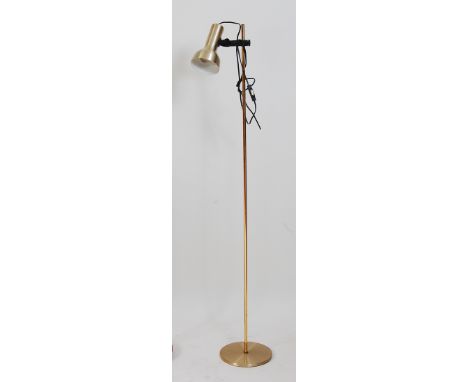 A 1970s gilt brass and brushed aluminium floor lamp, having removable and rotating shade, on circular integral base, h.141cm