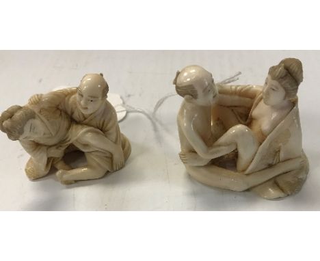 A 19th Century Japanese Meji Period carved ivory erotic netsuke as two lovers signed to base and another similar 4.5 cm high 