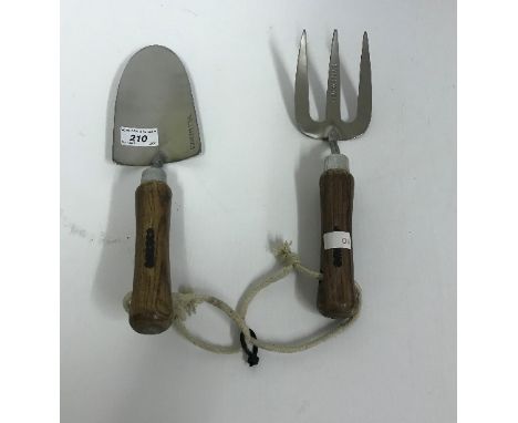 An Amtech stainless steel wooden handled hand trowel and fork
