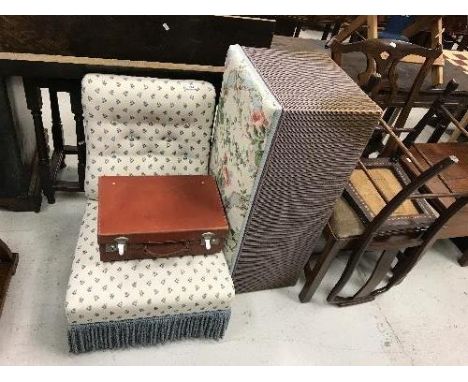 An upholstered nursing chair, leather suitcase, Lloyd Loom linen basket, 19th Century Provincial Chippendale style dining cha