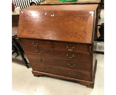 A 19th century teak bureau, the sloping fall enclosing a fitted interior over 2 short and 3 long drawers on ogee bracket feet