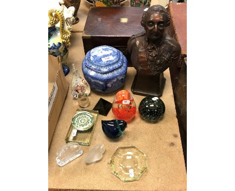 A collection of glass paperweights to include Nybro paperweight of a Nordic longboat, a stylised chick paperweight, Caithness