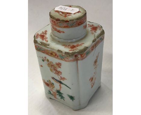 An 18th Century Chinese Qianlong tea caddy of small proportions, decorated in oxide red and famille-verte palette, raised on 