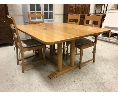 A modern oak dining table raised on twin pedestal supports united by an H stretcher, 152 cm long x 122 cm wide, together with