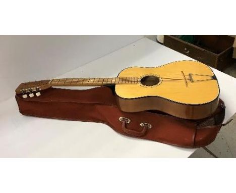 A Palma accoustic guitar, Model P.G.1, bears label to the interior, with case and embroidered strap