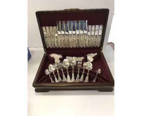 A cased set of six silver coffee spoons, a cased set containing two silver twin-handled salts and spoons and a case containin