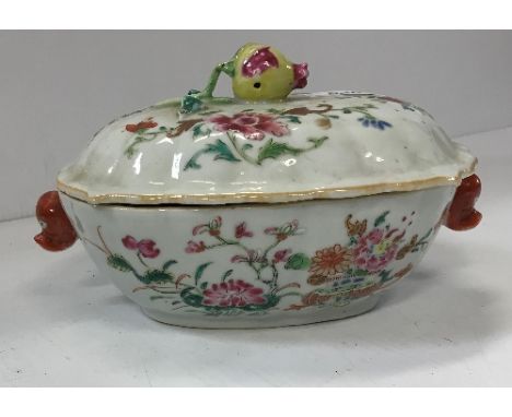 A Chinese Qianlong famille rose decorated tureen with pomegranate finial flanked by elephant head handles circa 1750-60, bear