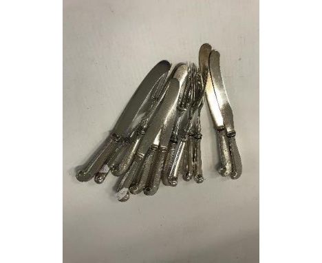 A set of six 19th Century pistol grip three prong forks, together with six matching knives CONDITION REPORTS The overall leng