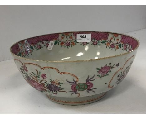 A 19th Century Chinese puce and green floral decorated fruit bowl, 26.5 cm diameter, a Chinese Imari mug with willow and figu