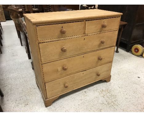 A stained pine chest of two short over three long drawers on bracket feet, 107 cm wide x 105 cm high and a Victorian mahogany